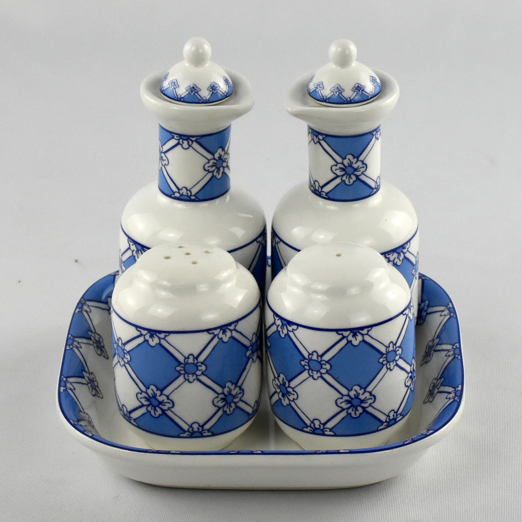 Galheteiro, saleiro e pimenteiro com travessa em porcelana EMA AC1637 (1)